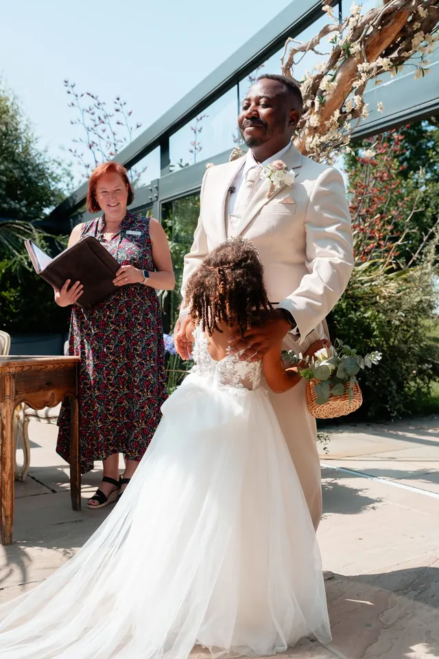 Sarah leading an outdoor wedding ceremony